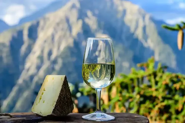 Swiss WIne and Cheese with Alpine mountains